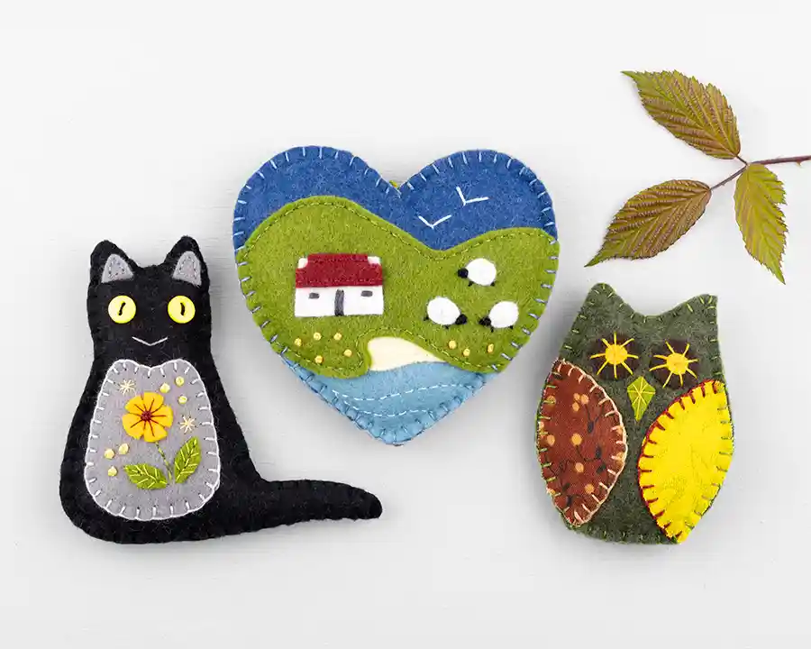 Black cat, owl and cottage heart, examples of our felt ornament sewing pattern range